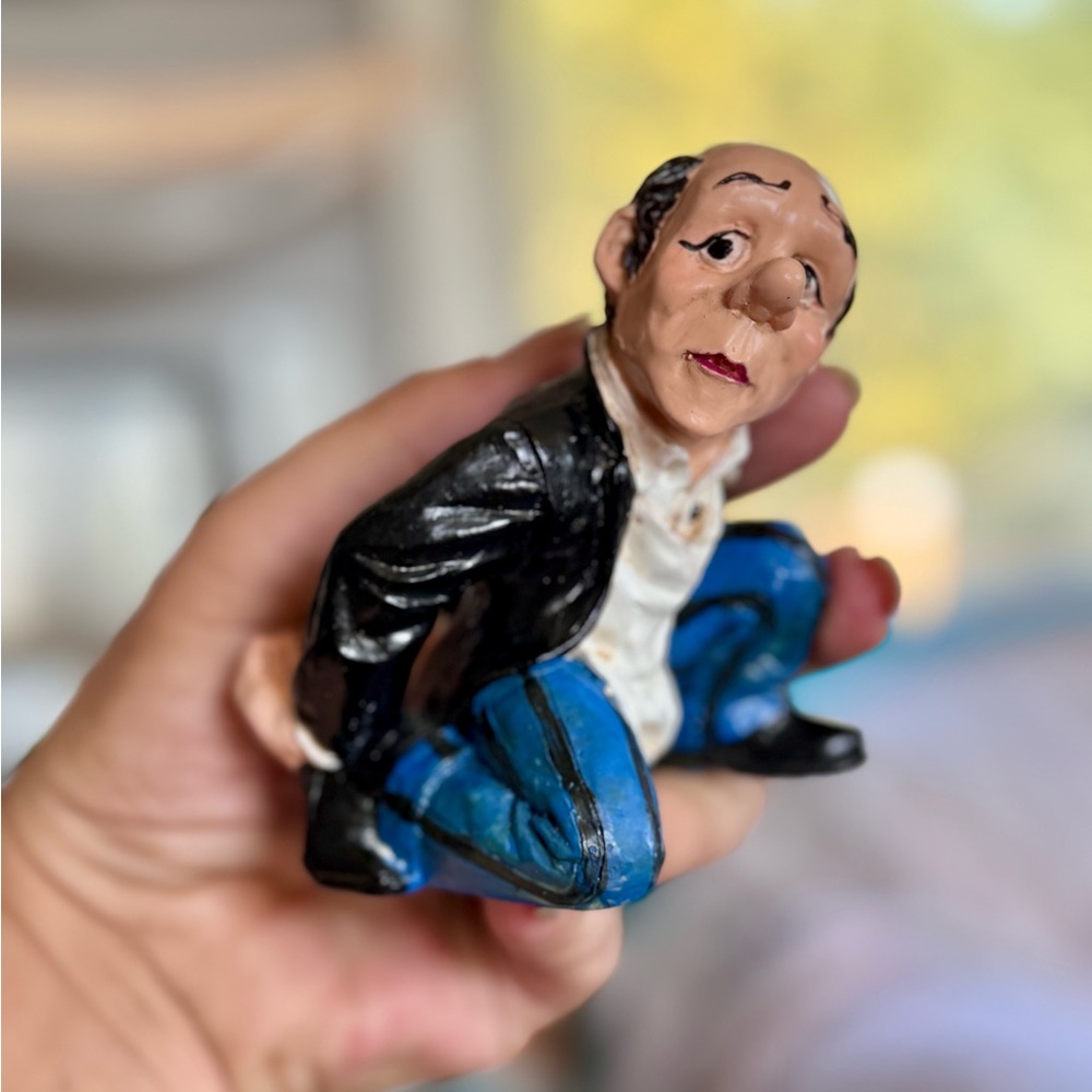 Handcrafted Bottle Holder Figurine with Black Jacket and Blue Pants